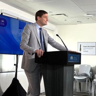 Premier David Eby speaks to reporters at Victoria PCN Allied Health Centre on May 12, 2025, announcing applications from U.S.-trained nurses are up 127 per cent since launching a streamlined registration process in April 2025.